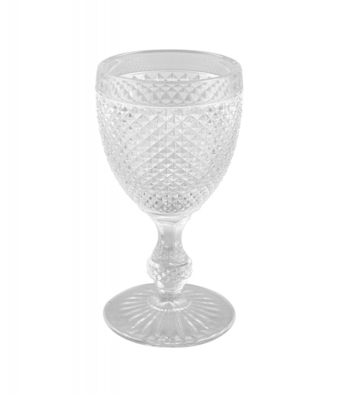 Wine glass with a facetted relief