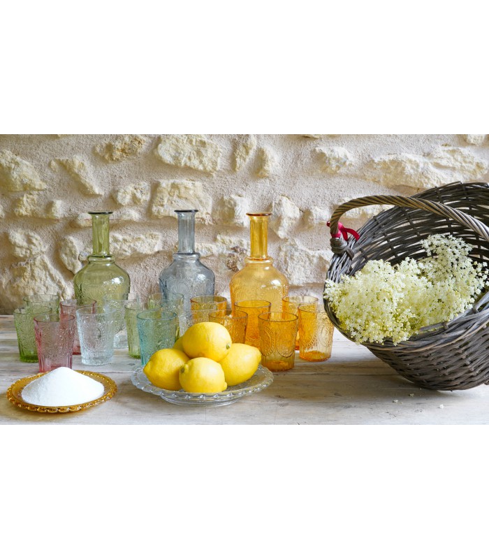 Glass carafe with fleur-de-lis ornament